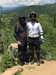 Doug Fashenpour and Brian Makel are shown in mountain biking gear.