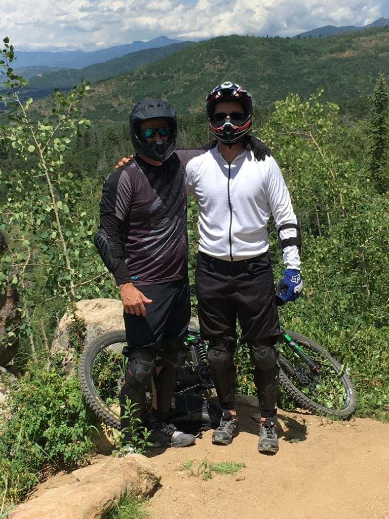Doug Fashenpour and Brian Makel are shown in mountain biking gear, just before his recovery from spinal cord injury caused by a bike accident.