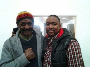 As he recovered from a stroke in the hospital, David Kenyatta's dad came every day to sit with him. The photo shows David Kenyatta, right with his dad, Mike Kenyatta, on his left.