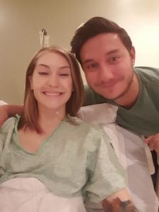 Alina Miller poses with her husband as she prepares to go into surgery.