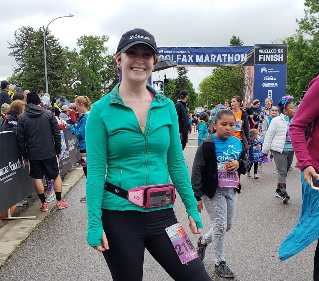 A photo of a woman at the Colfax Marathon in Denver.