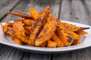 A plate of savory oven-baked pumpkin fries.