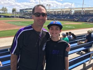 Scott Sarkisian and Son at a baseball field.
