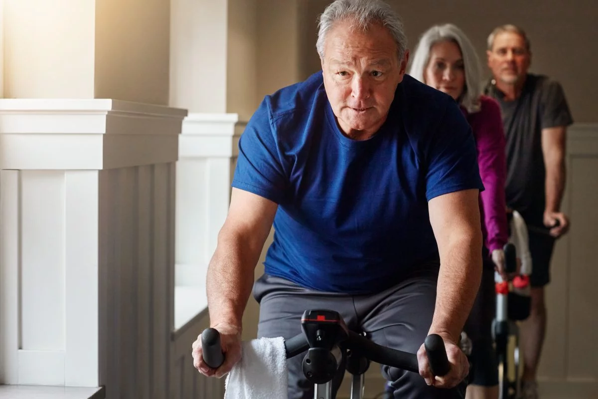 Shot of a group of seniors having a spinning class at the gym