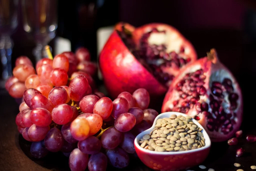 Grapes, pomegranates and lentils are considered lucky foods for the new year in some cultures. Photo: Getty Images.