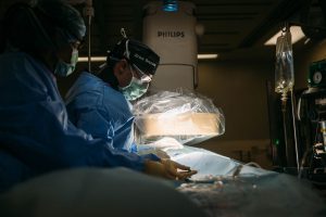 surgeons performing surgery to treat mitral valve disease in dogs