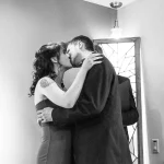 couple kissing in chapel