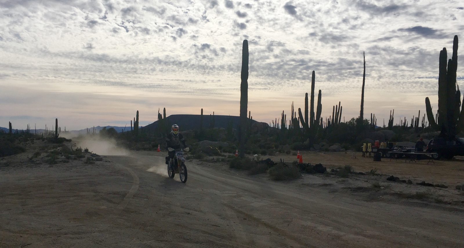 Chris Welch rides his dirt bike through the desert.
