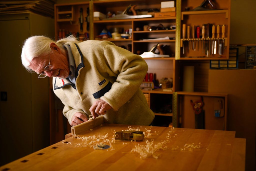 : Harv Mastalir at work in his Black Hawk shop.