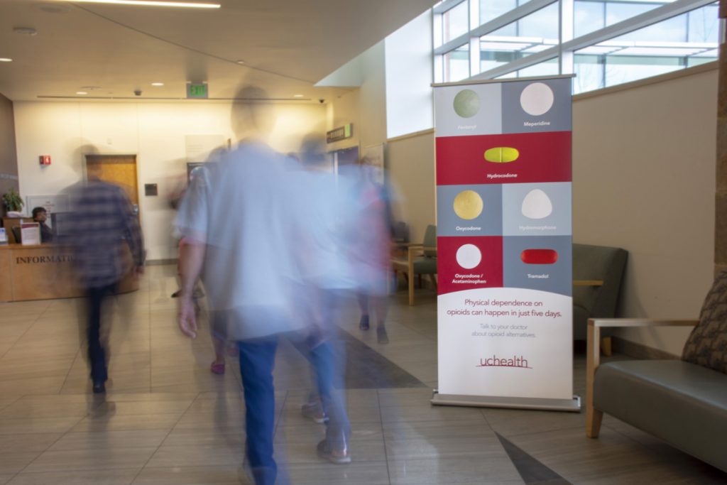 UCHealth aims to spark a conversation with patients about opioids. This banner shows one of the messages in the lobby of University of Colorado Hospital.