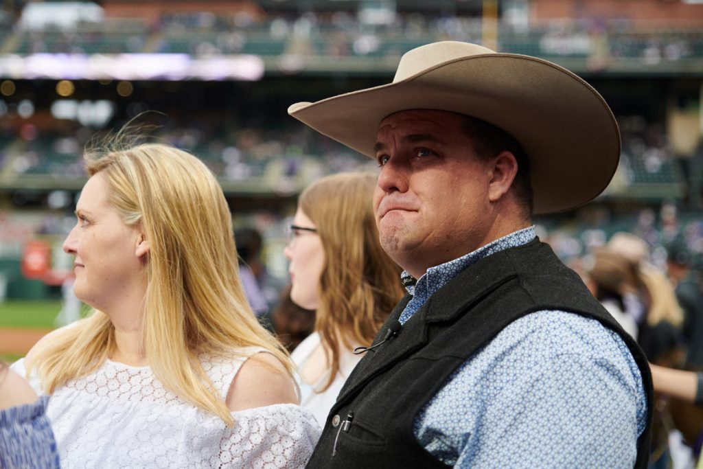 Mike Brashear, with a tear in his eye, on the field of Coors Field.