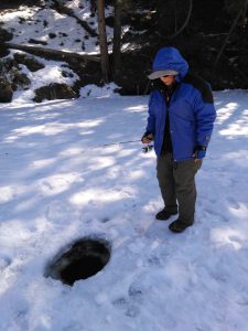 A photo of Lydia Friese ice fishing.