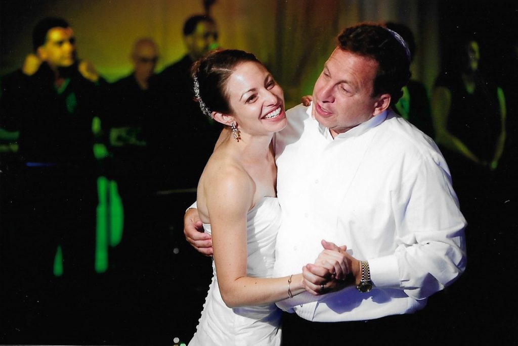 Dr. Hillary Yaffe dances with her dad at her wedding. Dr. Yaffe donated part of her liver to save her dad's life.