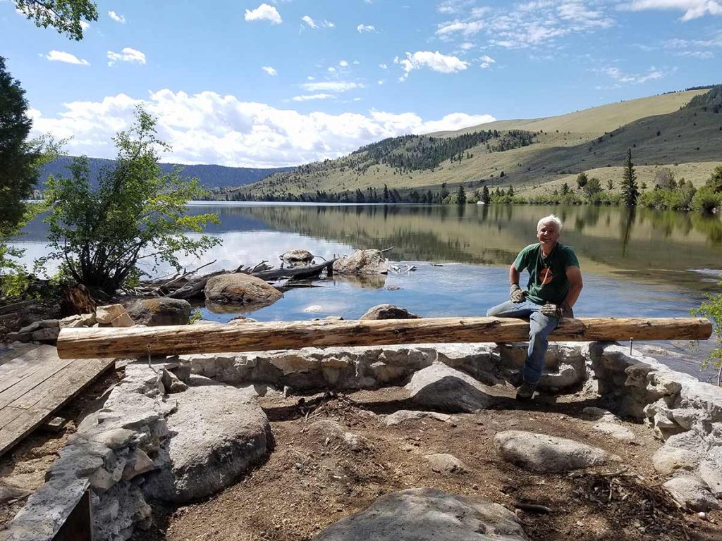Joe Boardman building a cabin in Wyoming.