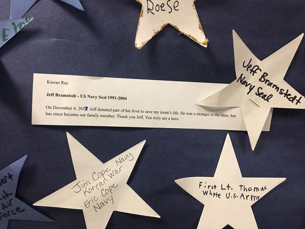 a sign honors former Navy SEAL, Jeff Bramstedt, who became a donor for a liver transplant
