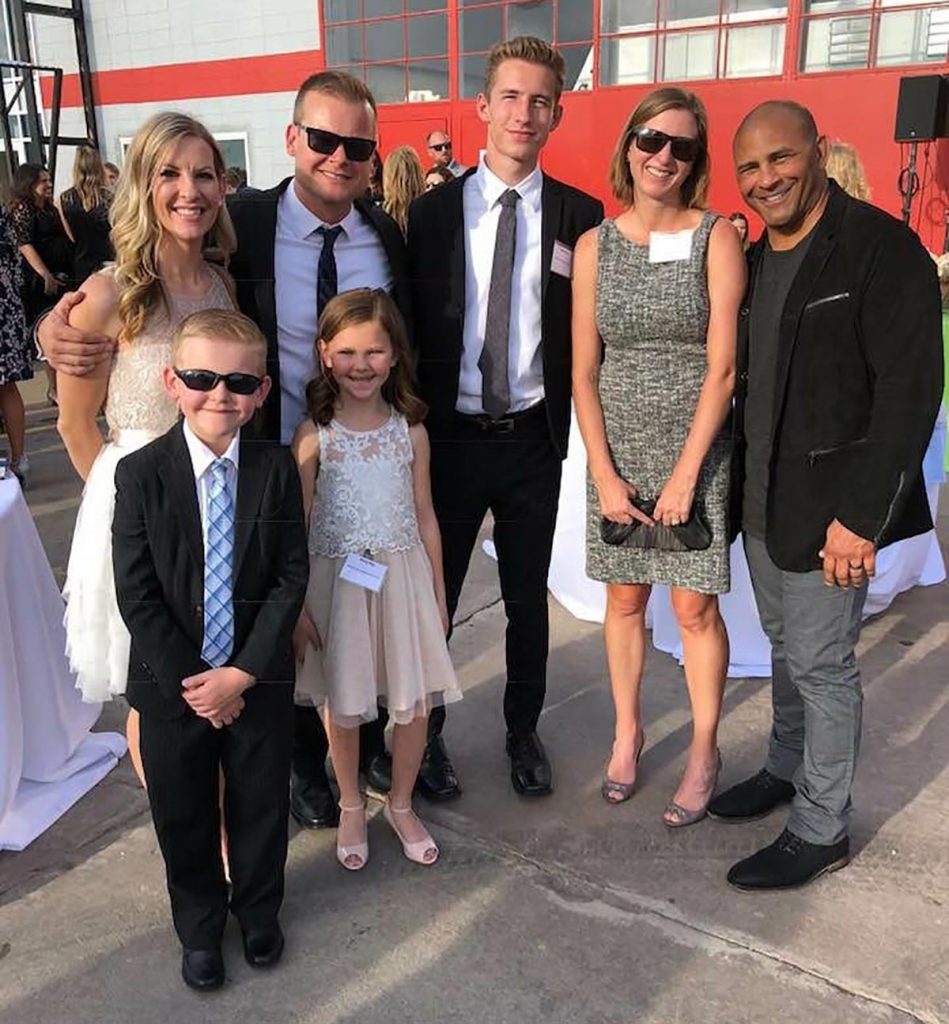 Liver transplant donor Jeff Bramstedt and his wife with liver transplant recipient, Melinda Ray, and her husband and children