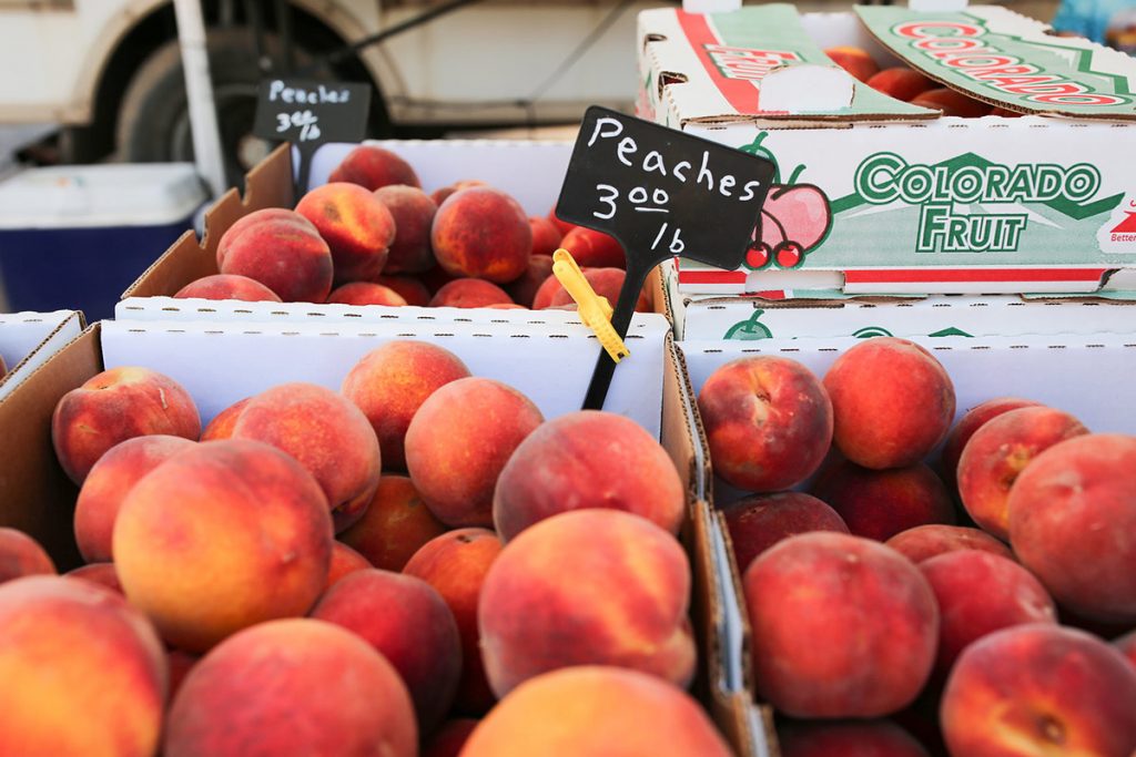 Boxes of fresh Colorado peaches