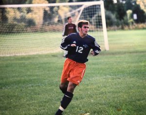 In this photo, Dave Grinnell plays soccer for Hope College in Holland, MI.