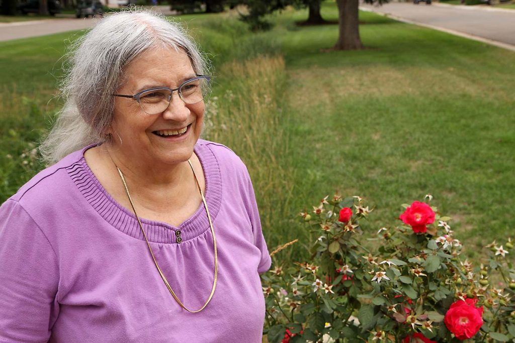 Photograph of Mary Smith, a picture of success for UCHealth mindful eating program, along her neighborhood walking route