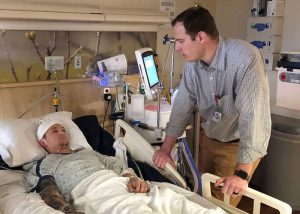 brain tumor survivor Chaise Webber in his hospital bed after a 30 hour surgery