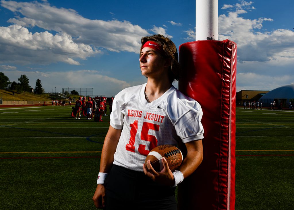 Nicco Marchiol in profile on the football field at Regis Jesuit High School. Marchiol is working with sports performance experts at UCHealth Steadman Hawkins Clinic Denver to run even better.
