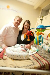 Libby and David Durkee in the NICU at UCHealth University of Colorado Hospital with Oliver, then two-and-a-half months old. Photo courtesy of Libby Durkee.