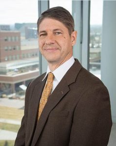 Dr. Todd Bull headshot. He helps patients with lung illnesses