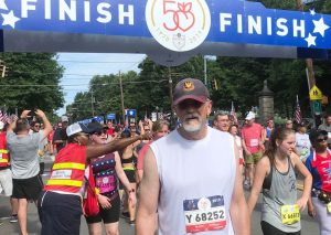 Dr. Harold “Corky” Dillon at the finish line after a long, hot race in July.