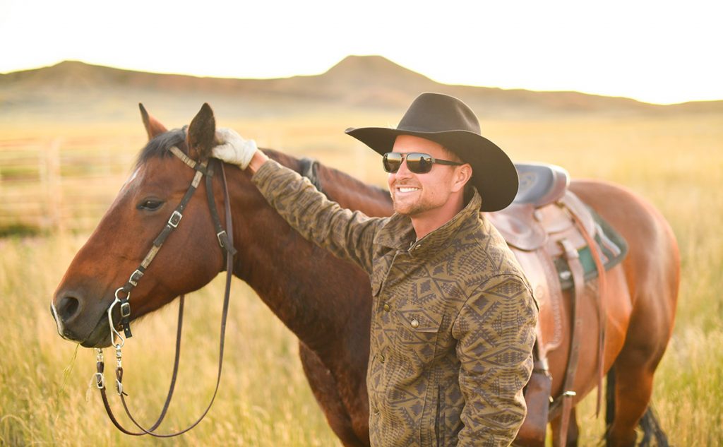 Rancher Nathan Kissack beat blood cancer. Here, he's with his horse, Dixie, at his parents' ranch in Gillette, Wyoming.