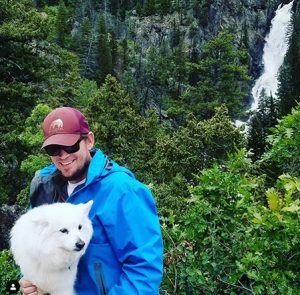 George Gess and dog Kodak hike at Fish Creek Falls in Steamboat Springs.