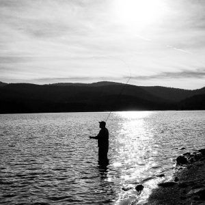 This is a photo of George Gess fishing at Hog Park Reservoir in Wyoming.