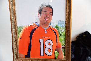 A portrait of Shakespear Log, a transplant donor, who loved Peyton Manning and the Denver Broncos.