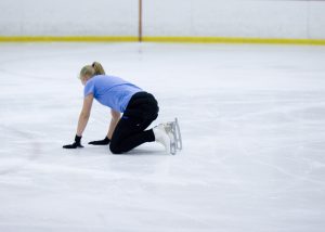 skater on the ice after a fall.