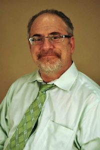 profile of medical director of the Seniors Clinic.
