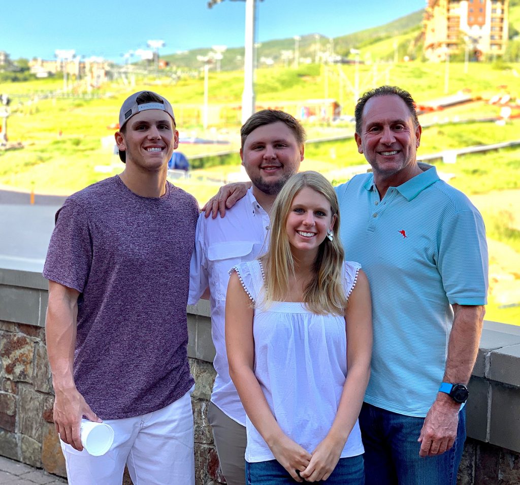This is a photo of Jake, Ben, Allie and Dr. Richard Gitter.