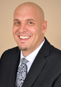 portrait of CJ Kleck, a spine surgeon.
