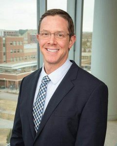 profile photo of orthopedic surgeon who performs surgery for knee arthritis.