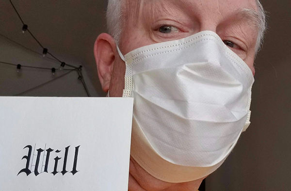 Bill St. John with his medical mask and a will