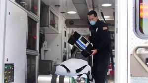 EMT responding to a medical emergency during the pandemic.