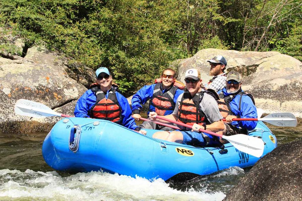 Lori Hopper rafts with friends.