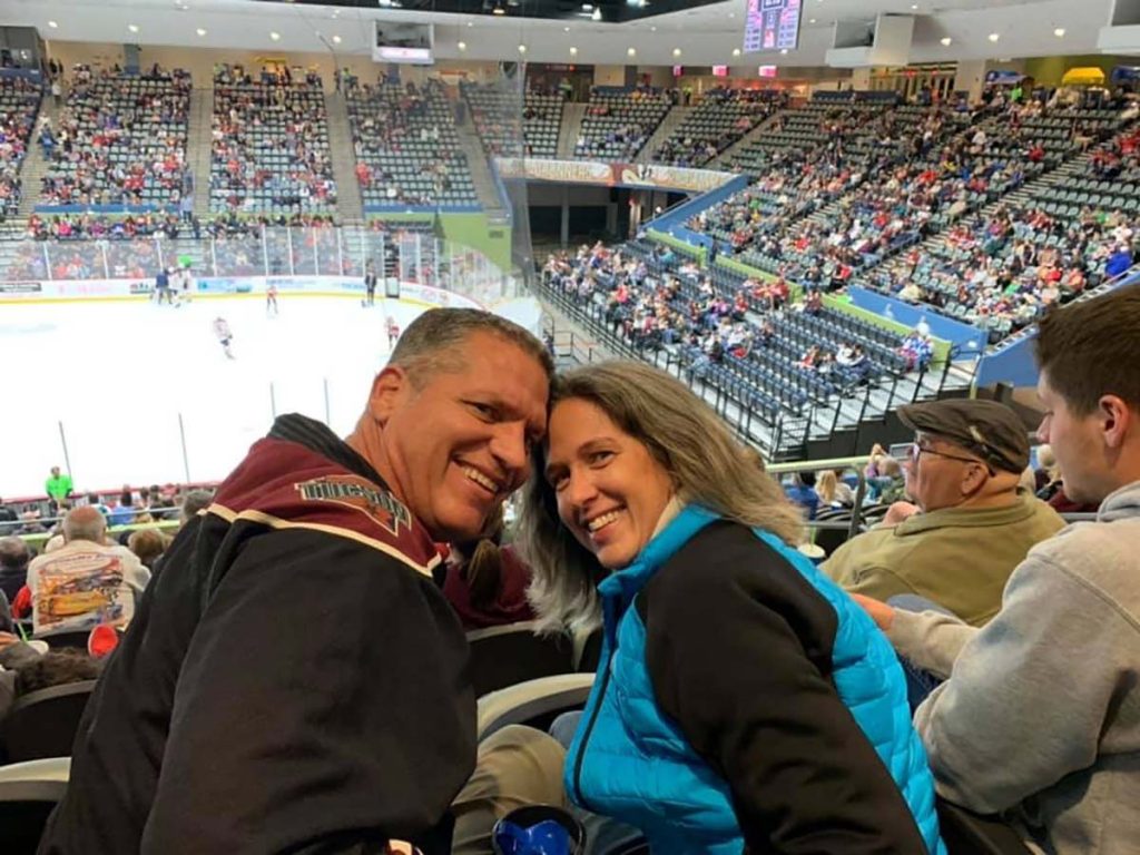 This couple from Tucson enjoy a hockey came