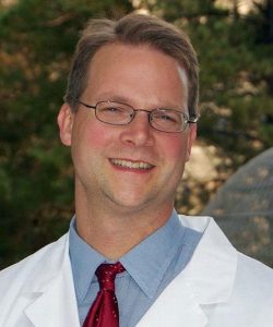 profile shot of a doctor who is leading a study to test effectiveness of a blood pressure drug to fight pancreatic cancer.