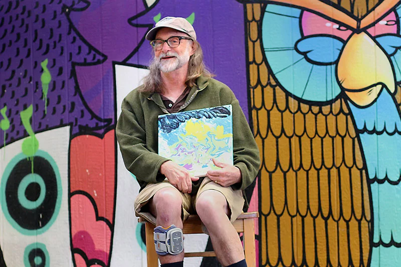 Jeff’s artwork mirrors the resilience he’s shown since losing most of the feeling on his right side following a hemorrhagic stroke. Photo by Joel Blocker, for UCHealth.