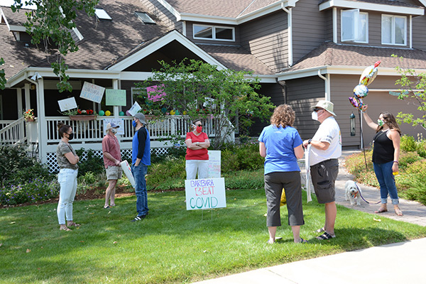 well-wishers gather to welcome Barbara Gould home