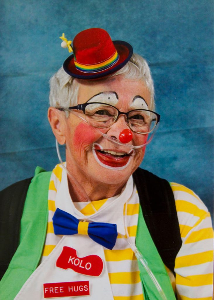 Fran, who has battled cancer, heart disease and pulmonary arterial hypertension, as a clown.
