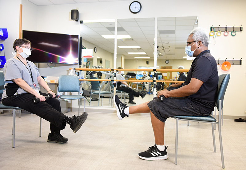 Clarence Troutman is a COVID-19 'long-hauler,' as people dealing with long-term symptoms of COVID-19 describe themselves. Here he works out at a special rehabilitation clinic.