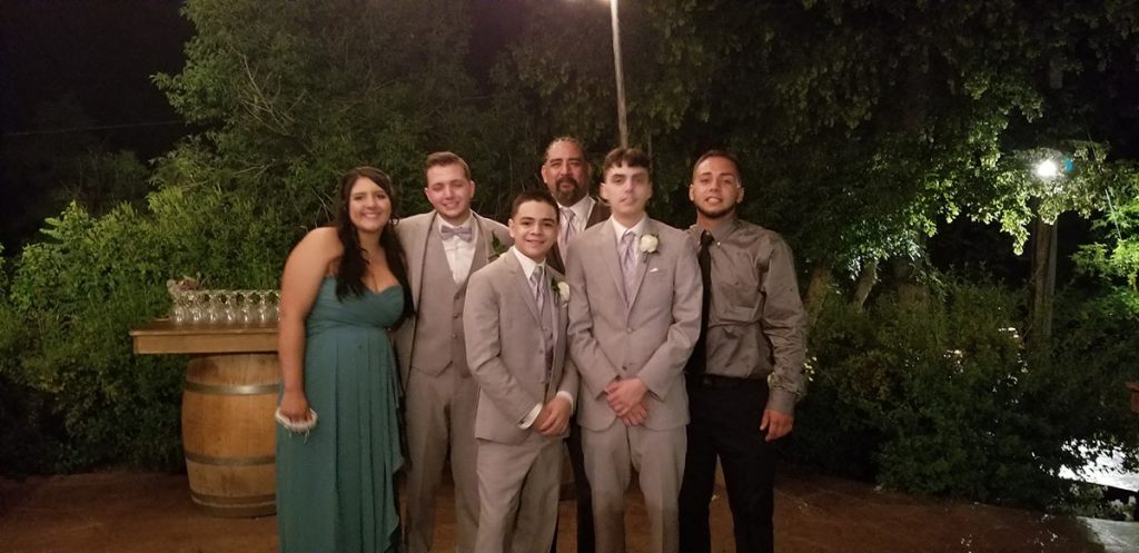 Casey Betancur, center, with his five children, all of whom have supported him during his battle with solitary plasmacytoma.