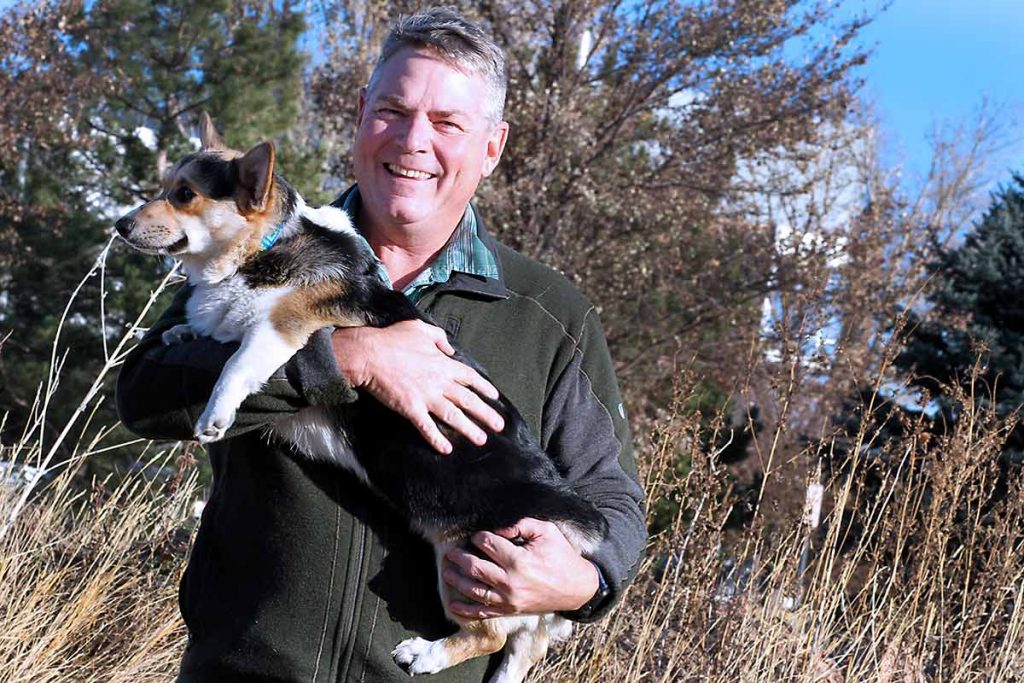 Daniel Gustafson holding his dog Pipen. Gustafason decided to donate convalescent plasma as a help to help patients and contribute to research.