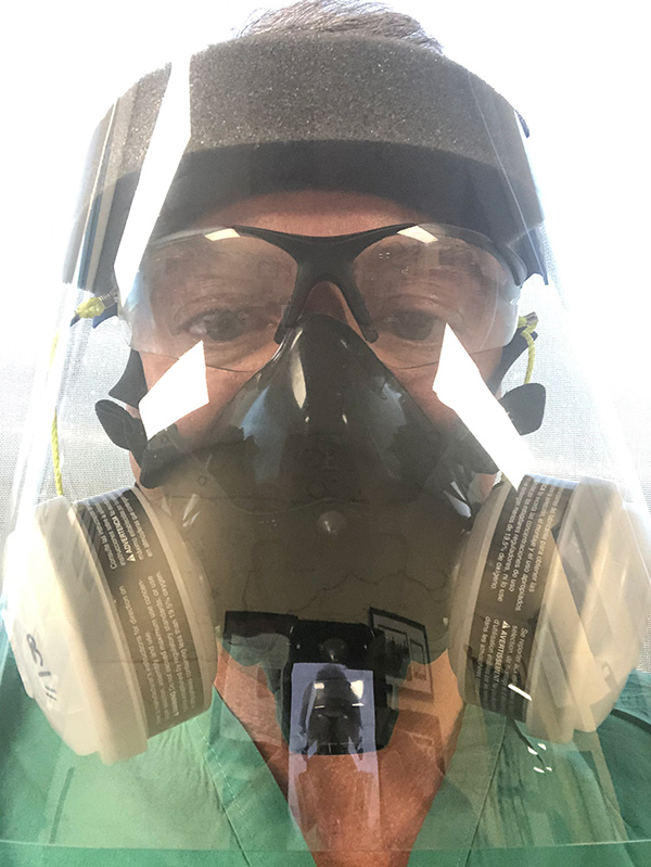 Dr. Richard Zane wearing a respirator mask. Zane is confident that COVID=19 vaccines are safe.