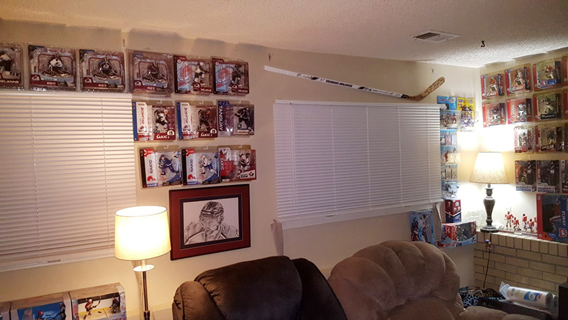Derek, who is getting immunotherapy for small cell lung cancer, man cave with all his sports memorabilia including a Avs hockey stick he recently got from his oncologist.